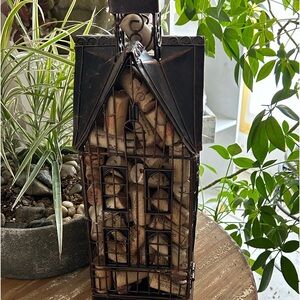 Wire wine cork container.